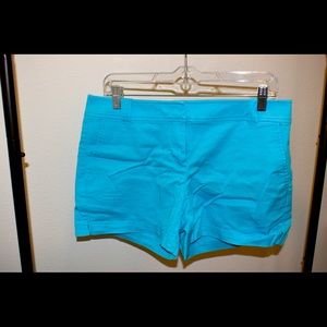 Brand new, Size 6 Tailored Mid-Rise Flat Front Blue Short.
